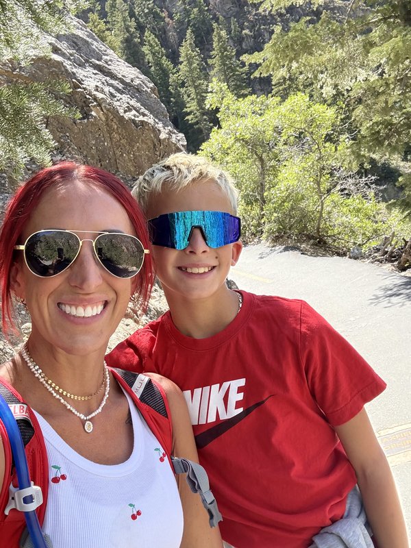 Cheyenne with her son on a Utah canyon trail